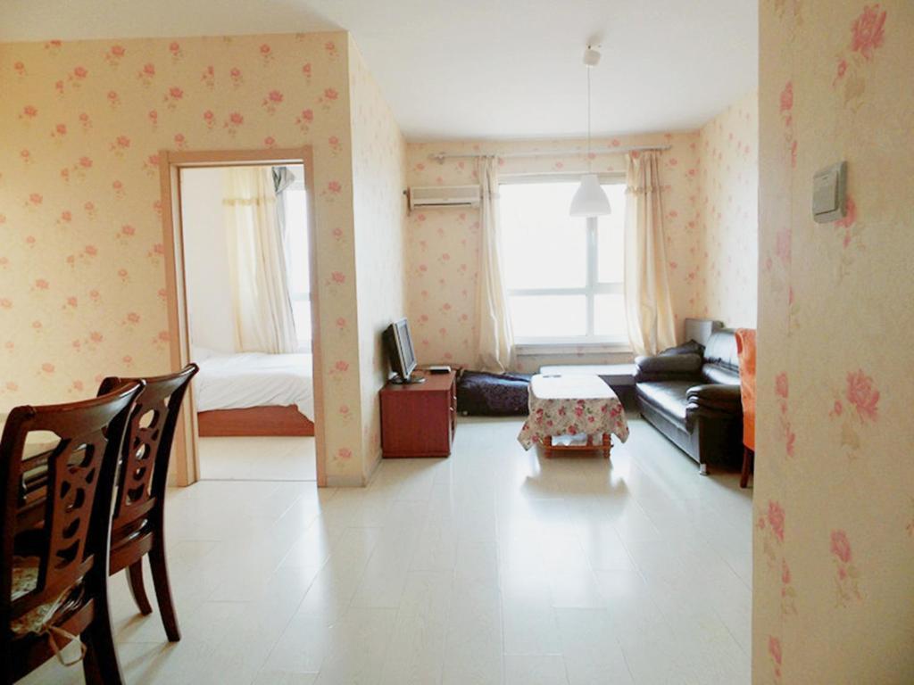 Xinghai Zhilian Apartment Dalian Chambre photo
